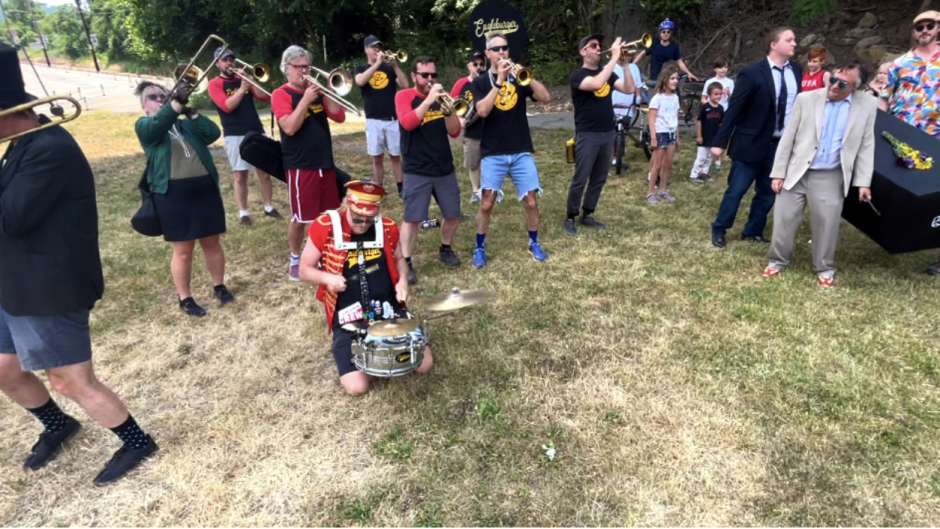 Eagleburger Band plays as the MOC casket is carried to Four Mile Run Field