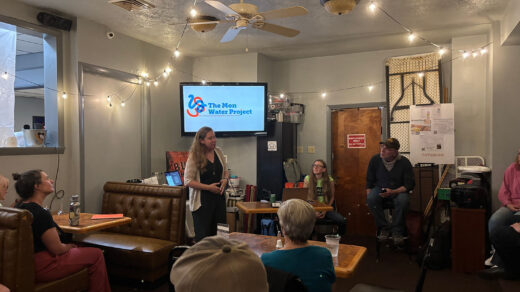 Mon Water Project Founder Ann Quinn, left, addresses Four Mile Run and Greenfield residents at Zano’s Pub House on June 9. To her right, speakers (and Homepage contributors) Ziggy Edwards and Ray Gerard listen. Photo by Marianne Holohan