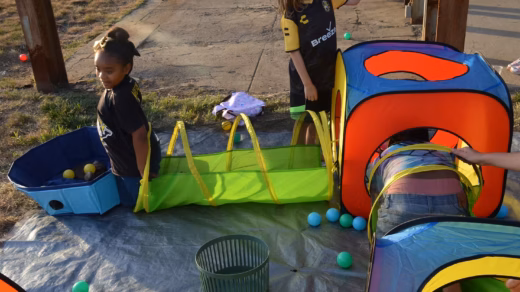Kids crawl through a simulated sewer system at the Aug. 27 event, Pittsburgh’s Got The Runs!, at the Roundhouse. Photo by Ray Gerard